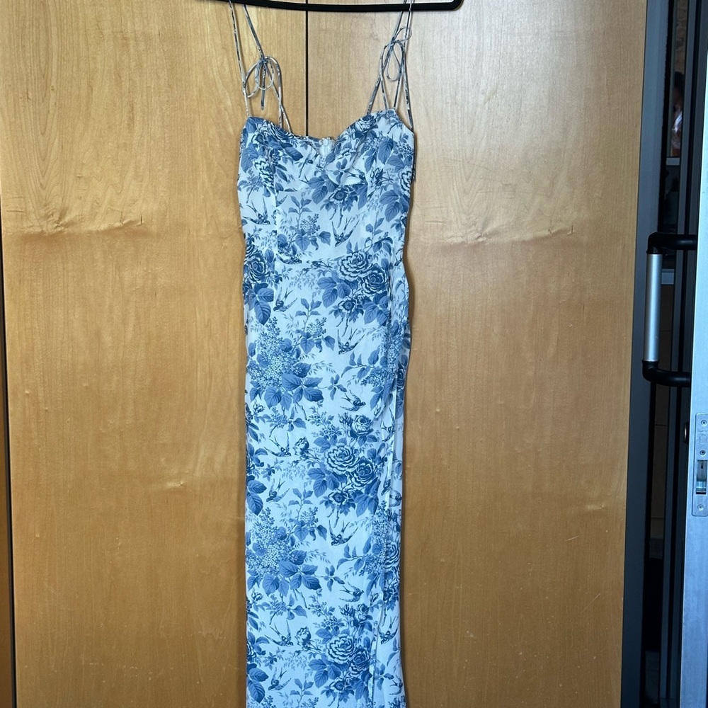 Reformation Blue and white Floral Dress with a slit.